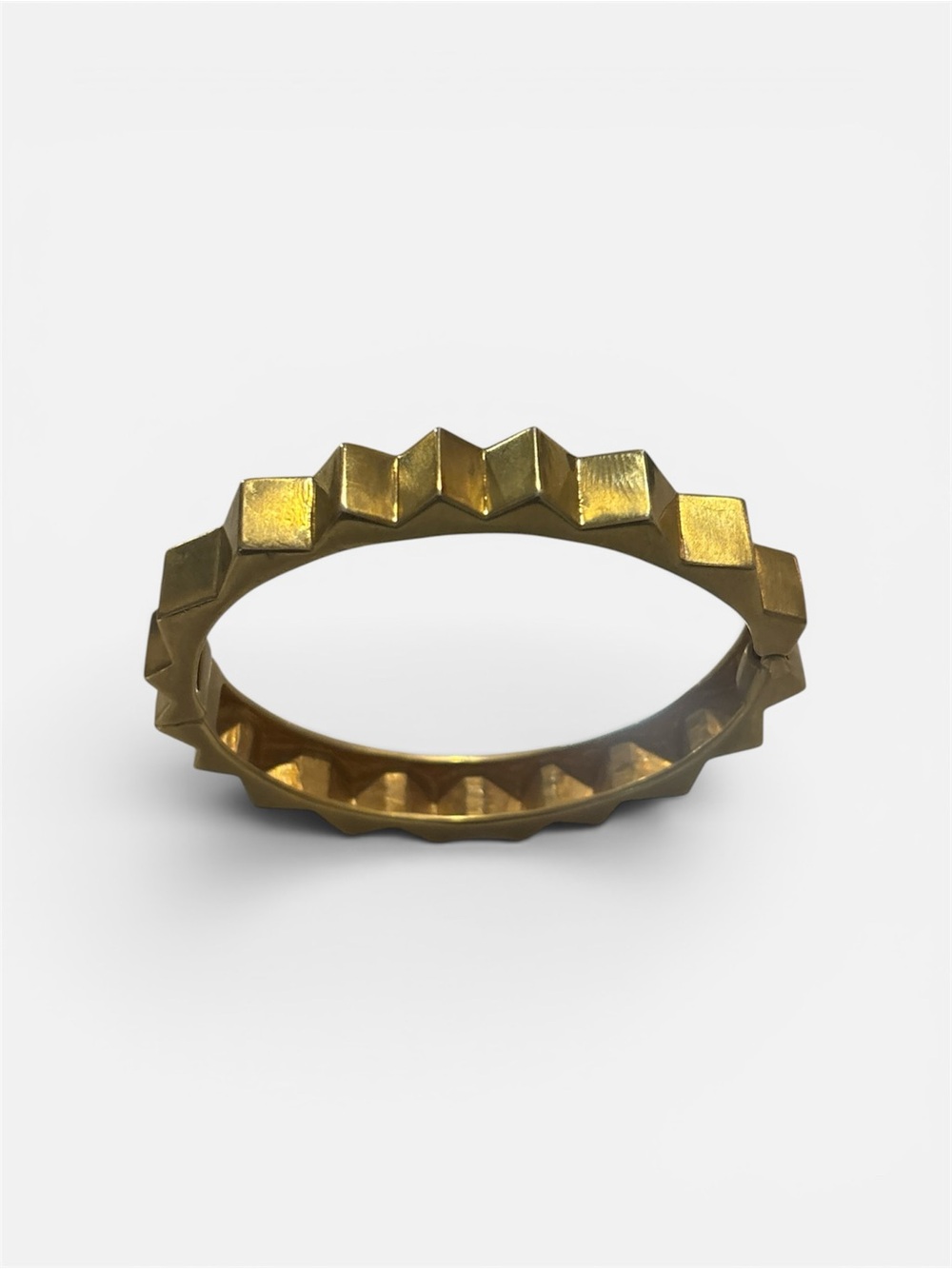 KJL gold tone spike clamper bracelet
